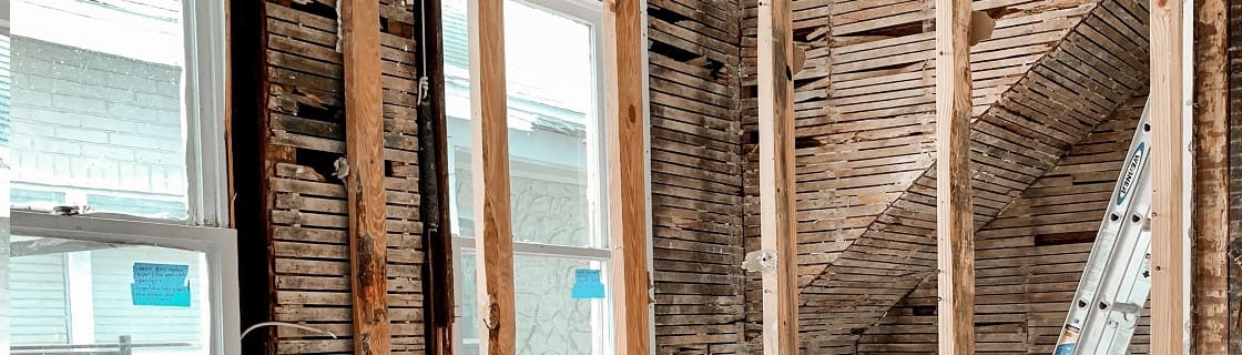property with wooden beams being converted